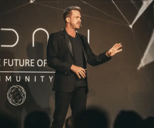 Greg W. Anderson, Senior Vice President of Innovation at Sovren, speaking on stage about building technology and revenue systems.